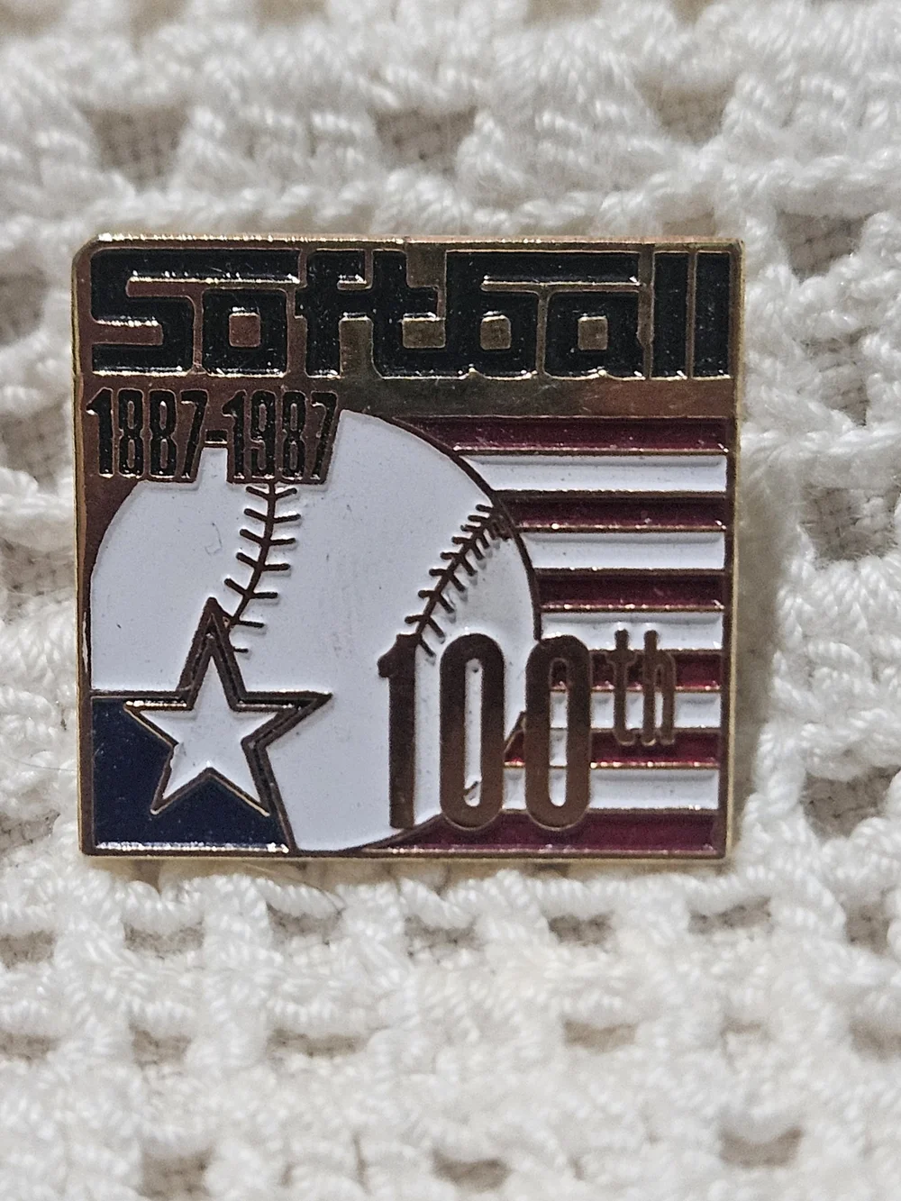 Softball 100th Anniversary Commemorative Pin - Gold, White, Blue, Red